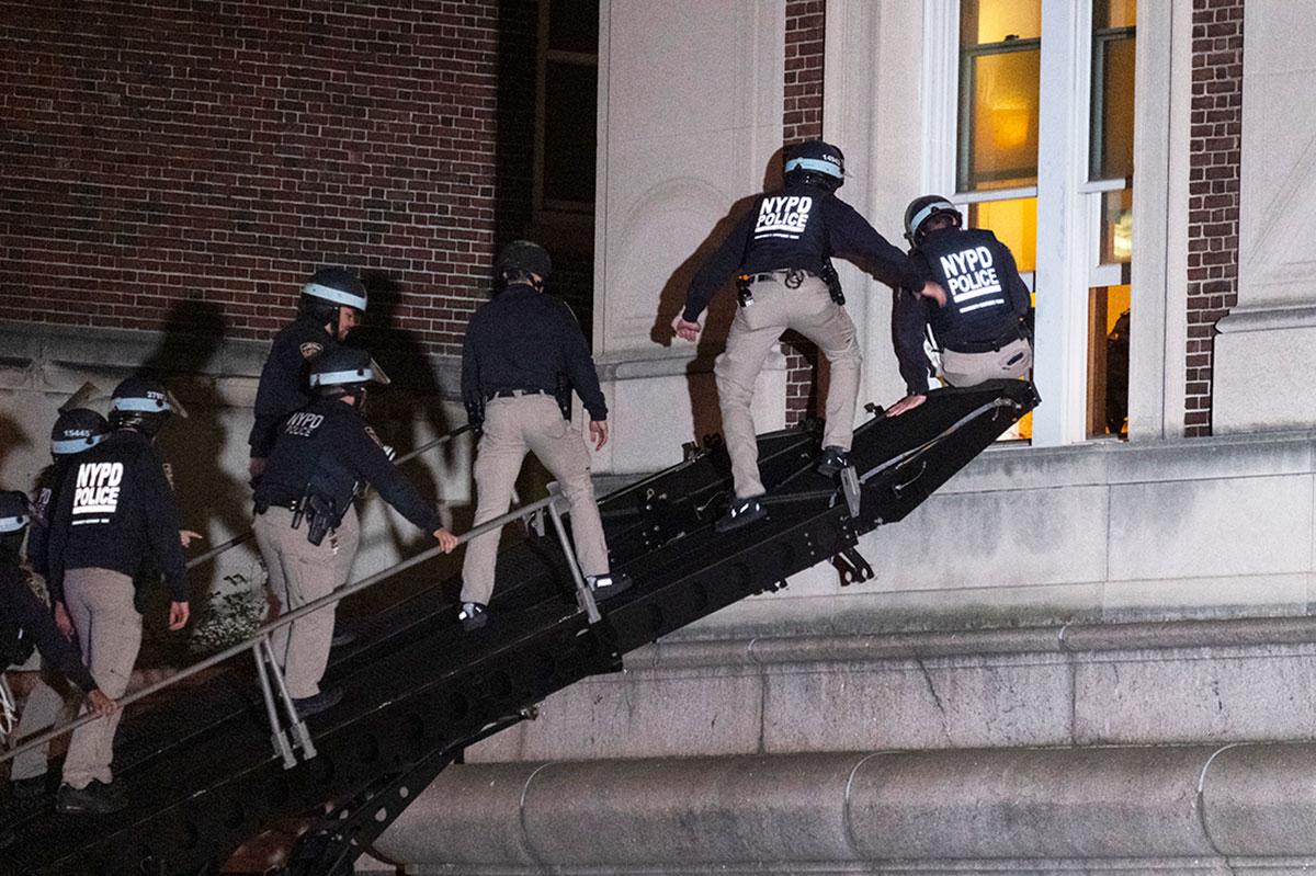 Dozens of NYPD forcibly enter Hind Hall to evict pro-Palestinian Columbia students April 30, 2024.