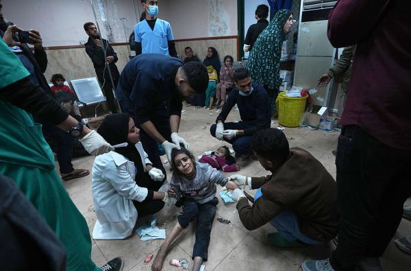 Palestinians wounded in Israeli bombardment of the Gaza Strip are brought to Al Aqsa hospital in Gaza Strip, February 22, 2024.