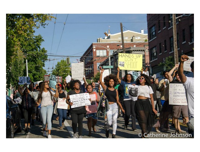 One of a series of protests that have taken place in Seattle in support of the fight for justice in Ferguson. Photo by Catherine Johnson. One of a series of protests that have taken place in Seattle in support of the fight for justice in Ferguson. Photo by Catherine Johnson.