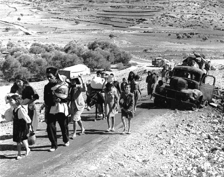 Palestinians driven from their homes in Galilee are on the road to Lebanon, November 1948.