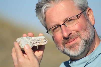 Neil Shubin communes with Thrinaxodon, a reptile-like mammal that’s been found inside burrows very similar to ones built by modern burrowing rodents.