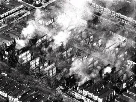 Osage Avenue burns after Philadelphia police dropped bomb on MOVE house. May 13, 1985.