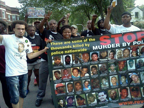 Joshua Lopez (left) with members of RiseUpOctober tour and people of Englewood community