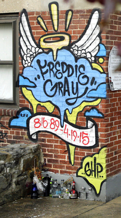 Mural at the spot where police  grabbed and arrested Freddie Gray.