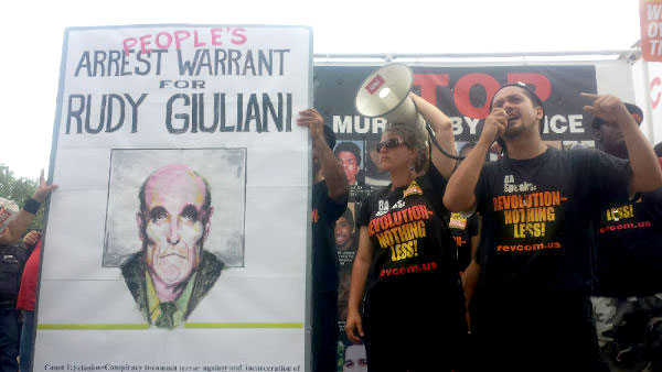 Revolution Club delivers 10-foot indictment to Giuliani in Cleveland