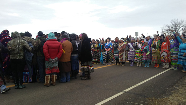 About 200 people came out onto the road Saturday afternoon for a prayer walk/dance ceremony/drum circle that would provide a presence on the road while some of the elders went to talk with  police about the police moving the blockade.​