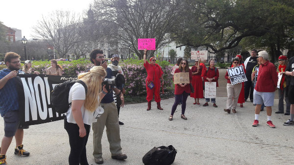 The Drive Out Trump/Pence Regime Tour is in New Orleans, where they marched on International Women’s Day.