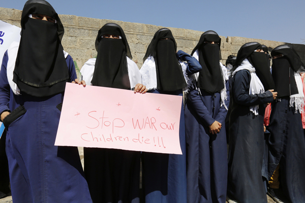In Sanaa, Yemen, women protestors outside the UN offices opposed US-backed war with signs saying “Yemen women die due to war and siege!”