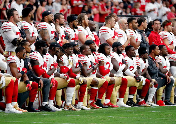 30 San Francisco 49ers take a knee on October 1.