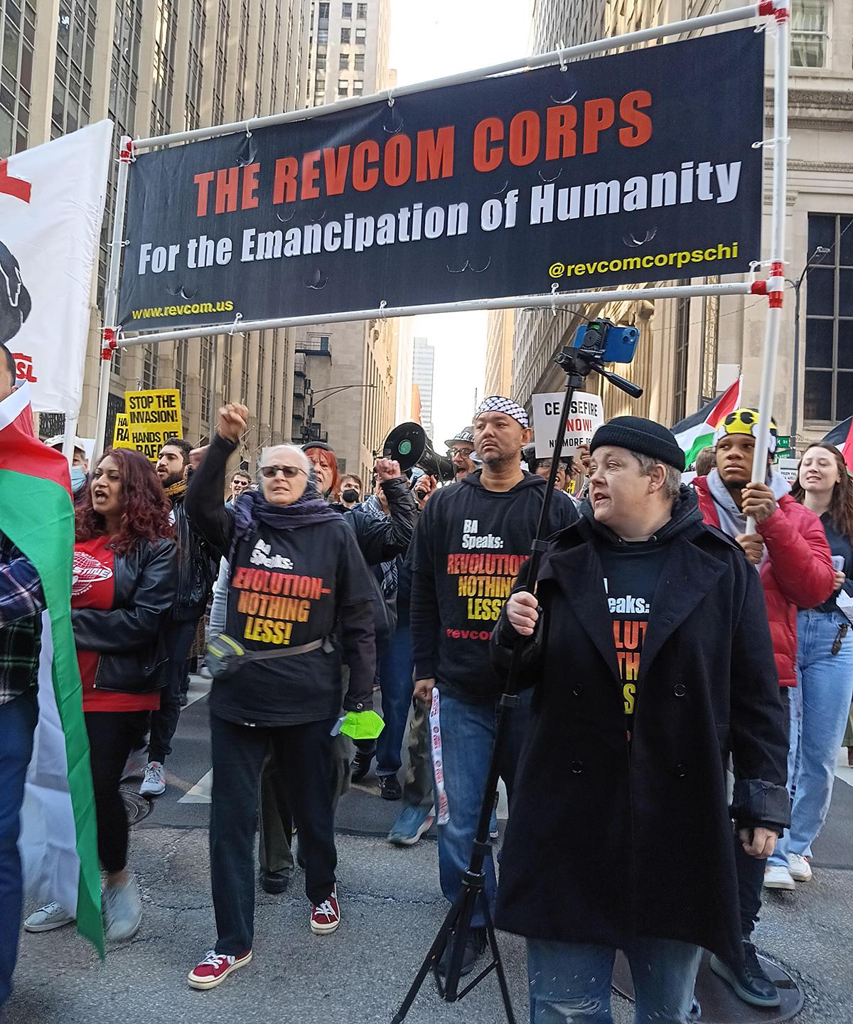 In Chicago, March 2, a contingent of revcoms marched defiantly under the banner “ The Revcom Corps for the Emancipation of Humanity.” 