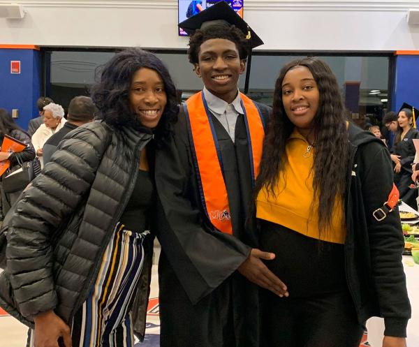 Dexter Reed, center, along with his mother Nicole Banks and sister Porscha Banks, 2019. 