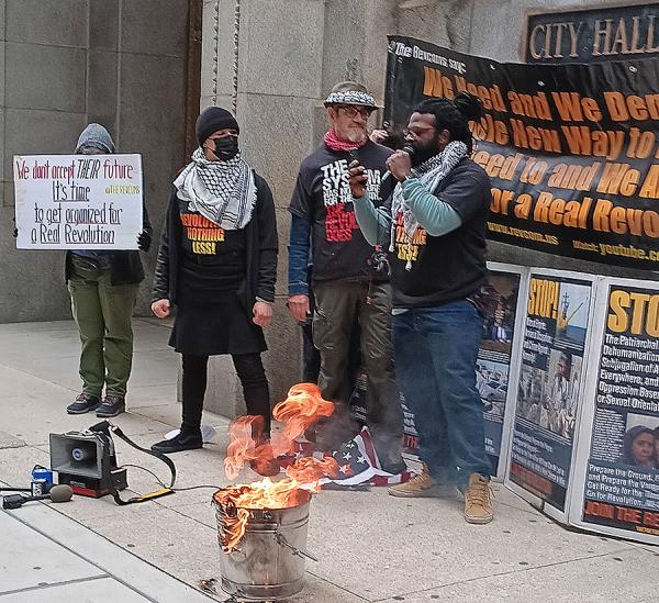 In Chicago, April 1, 2024, the Revcom Corps, including one who is a Vietnam era vet, burned an American flag in front of City Hall.