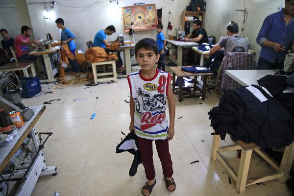 Syrian refugees including children in Turkey sweatshop.
