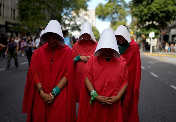 IWD Argentina women in handmaids garb