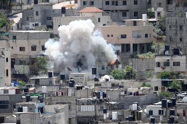 Explosion from Israeli bombardment of the Nur Shams refugee camp near the town of Tulkarem, Gaza, April 20, 2024.